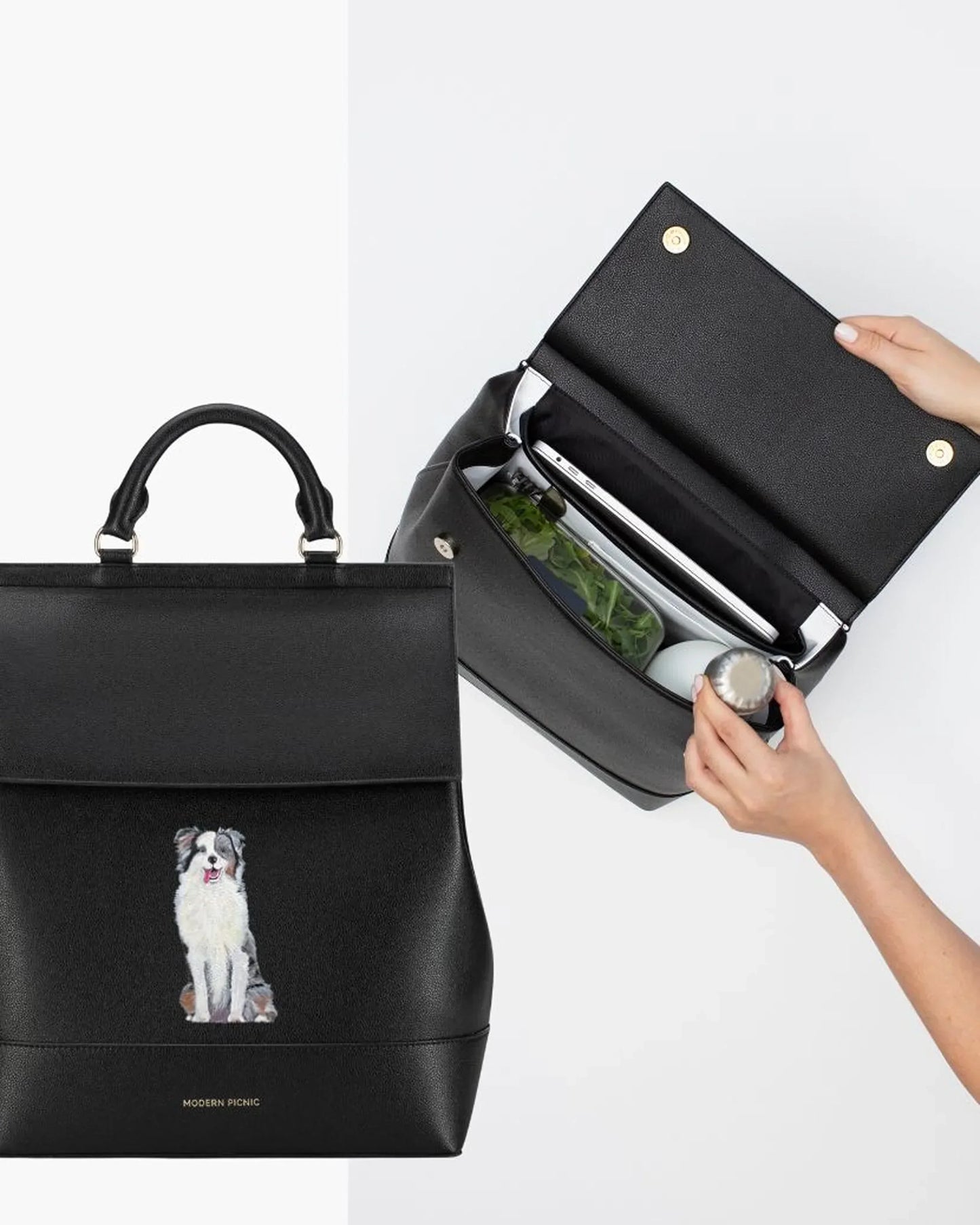 Black insulated vegan leather lunch tote with dog illustration, shown open with food inside