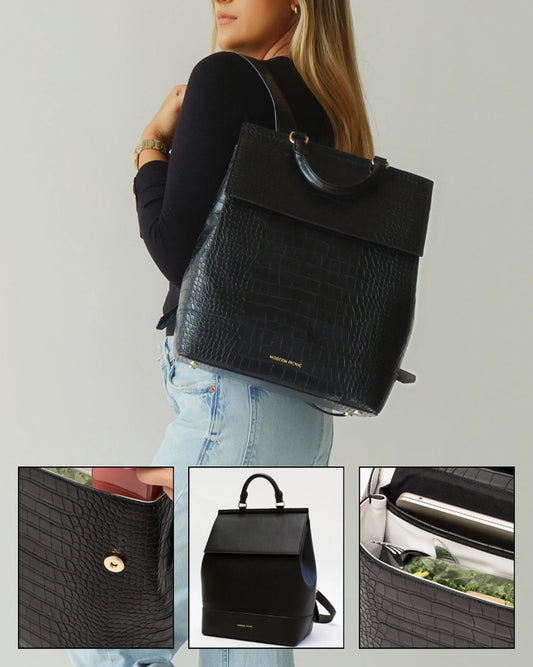Woman wearing black vegan leather insulated backpack with croc texture and gold hardware, featuring lunch storage compartments.