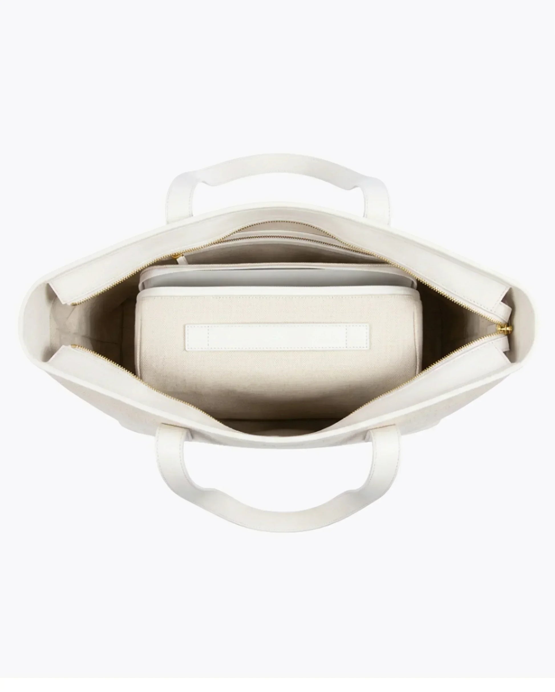 Cream insulated lunch tote with gold zipper, vegan leather handles, and interior compartment for work or travel