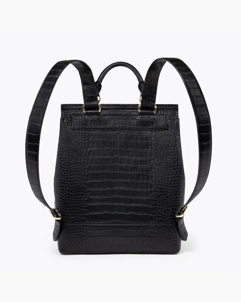 Back view of the black croc-embossed laptop backpack showing the adjustable shoulder straps and rear detail.