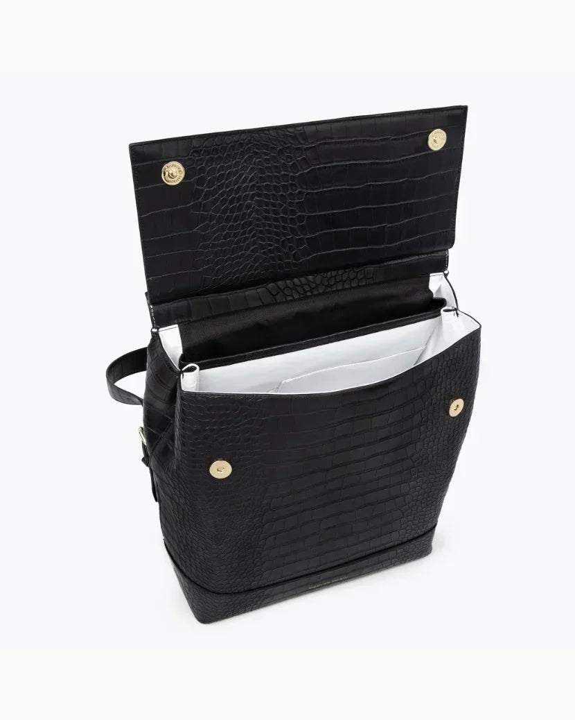 Interior view of the open black vegan leather insulated backpack with white lining and gold magnetic snap closures.