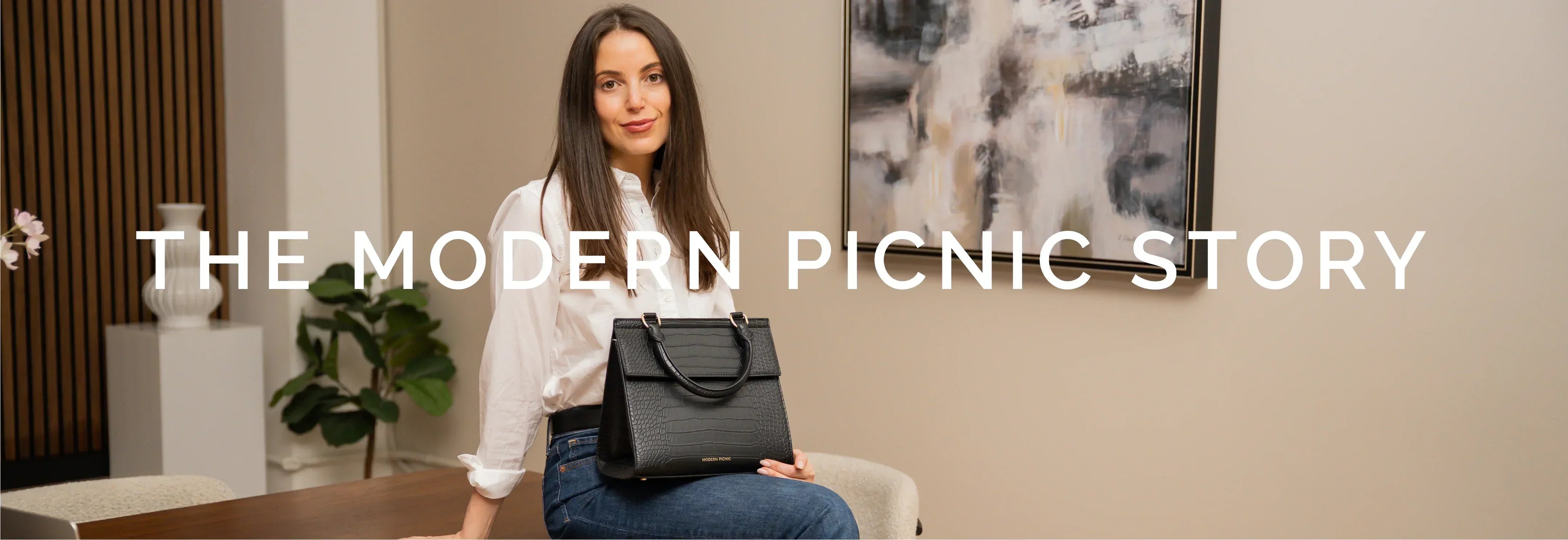 Stylish black vegan leather lunch tote for work and travel, chic and insulated design