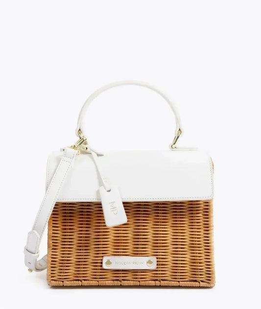 White vegan leather and wicker tote bag with top handle and shoulder strap