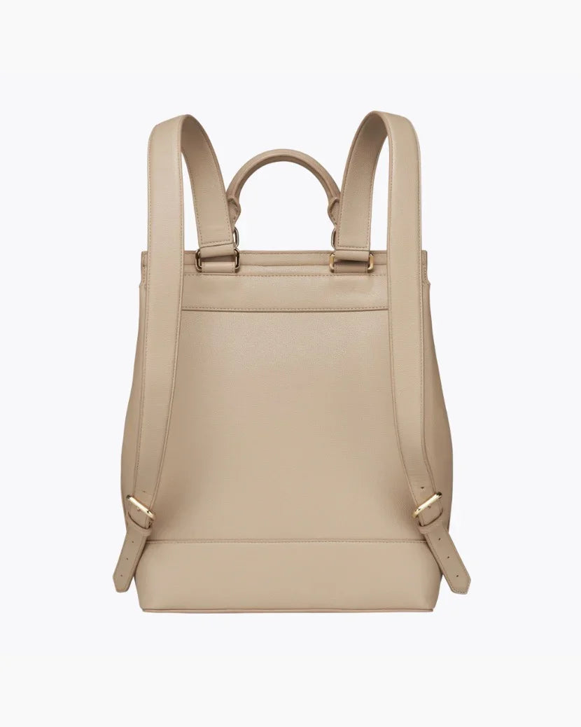 Back view of the cream crocodile-embossed insulated backpack with adjustable shoulder straps and top carry handle.