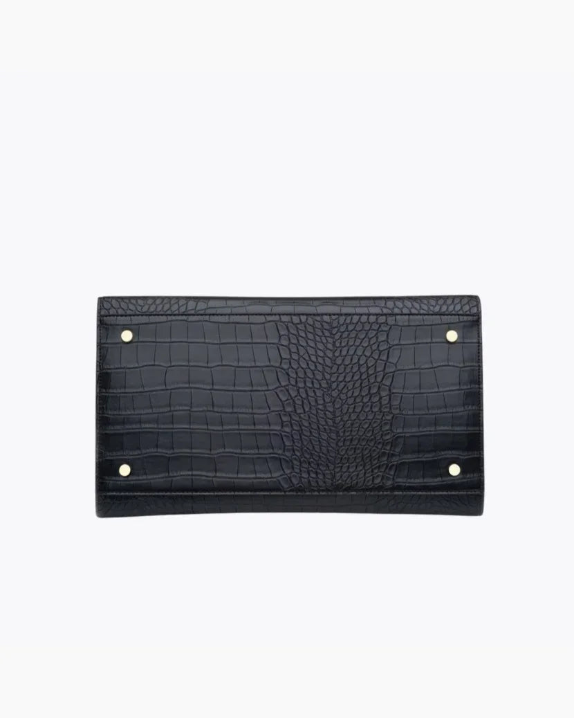 Bottom view of black croc large luncher with gold accents 