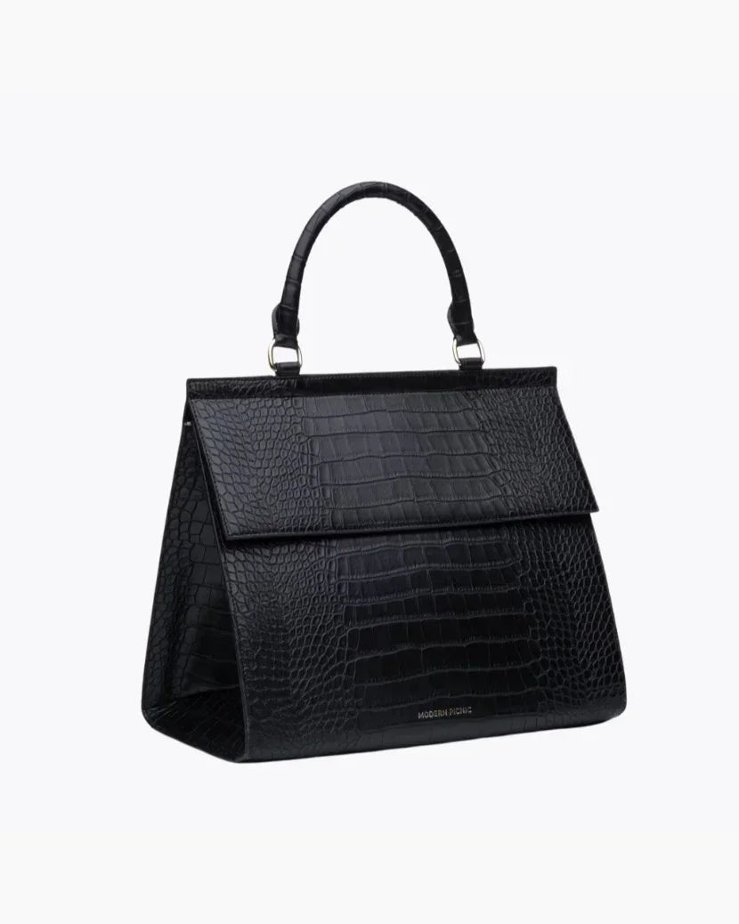Side angle view of The Large Luncher - Black Croc showing structured design and top handle.
