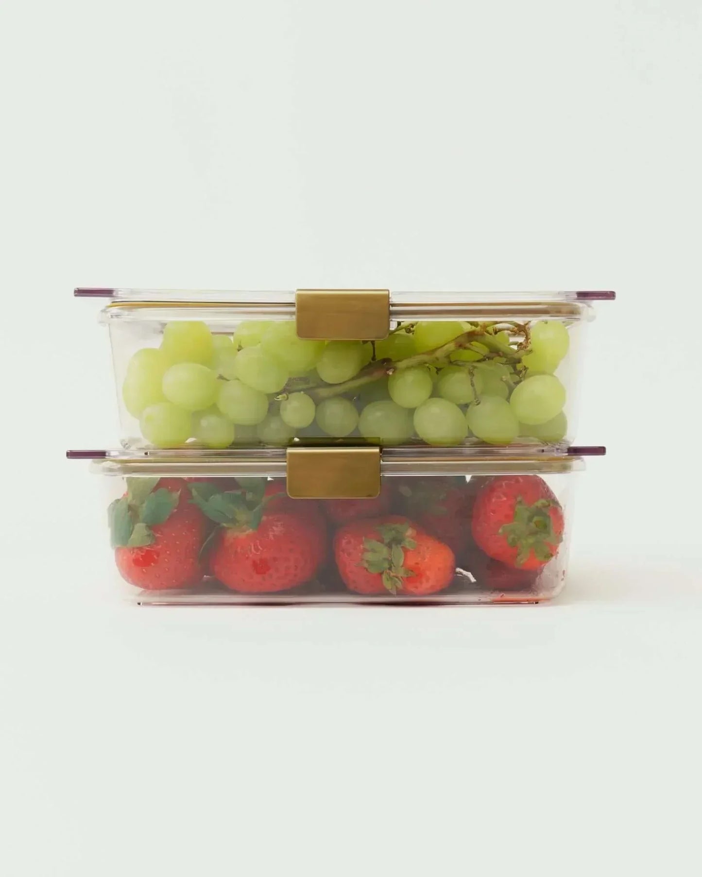 Clear lunch containers with grapes and strawberries, perfect for healthy meals on the go