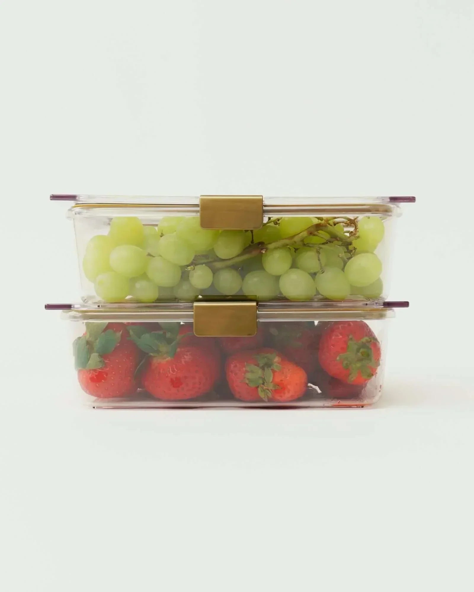 Clear lunch containers with grapes and strawberries, perfect for healthy meals on the go